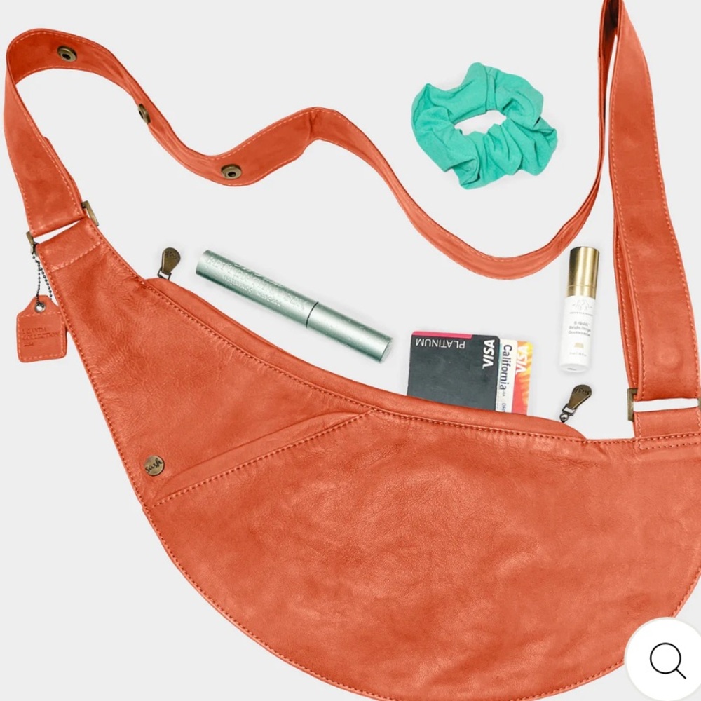 Curved Crossbody Crescent Bag in Coral